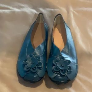 Blue leather flats
